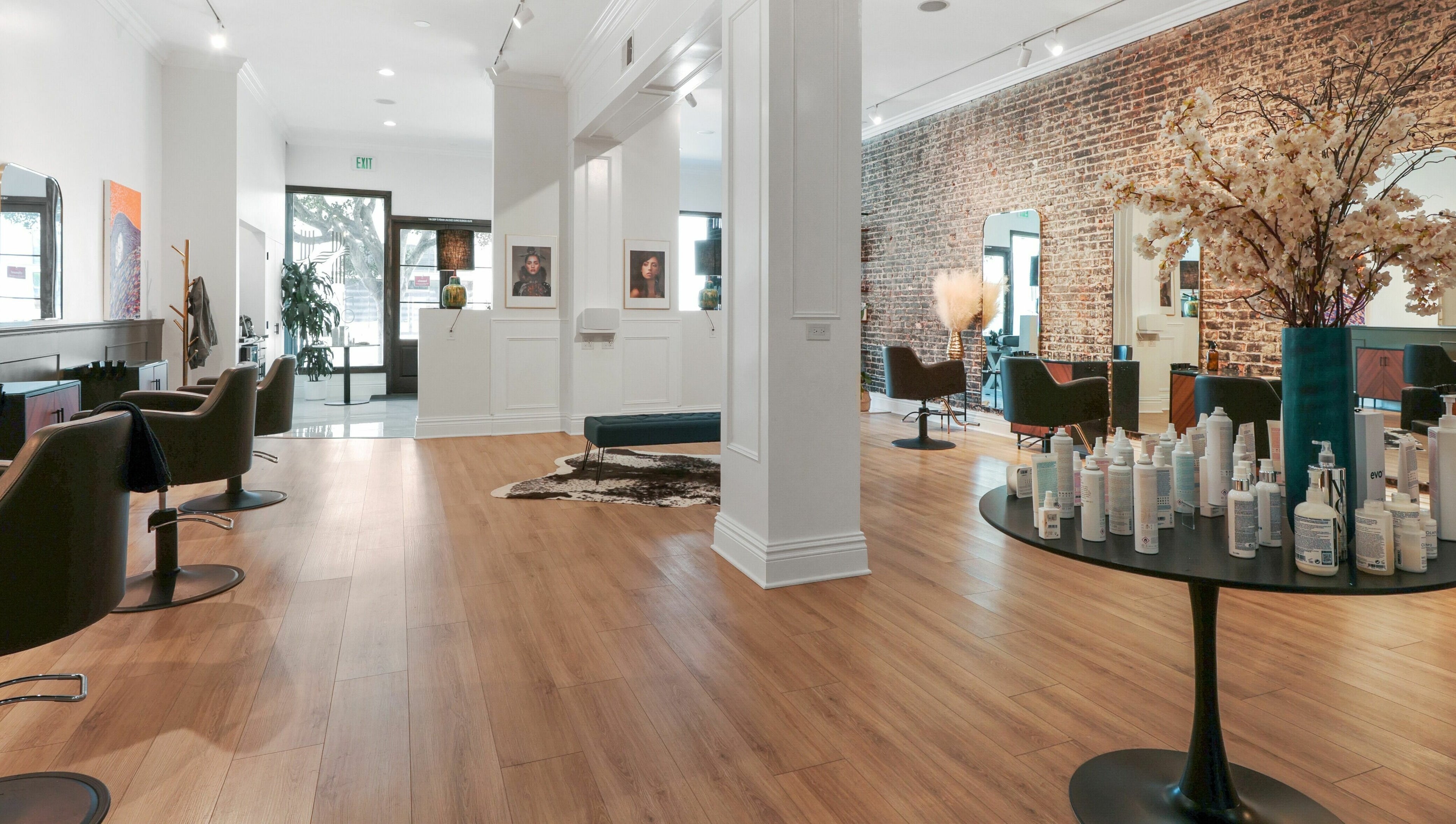 Modern interior of Halls Of Ivy Salon in Los Angeles, California, US with stylish decor and beauty products.