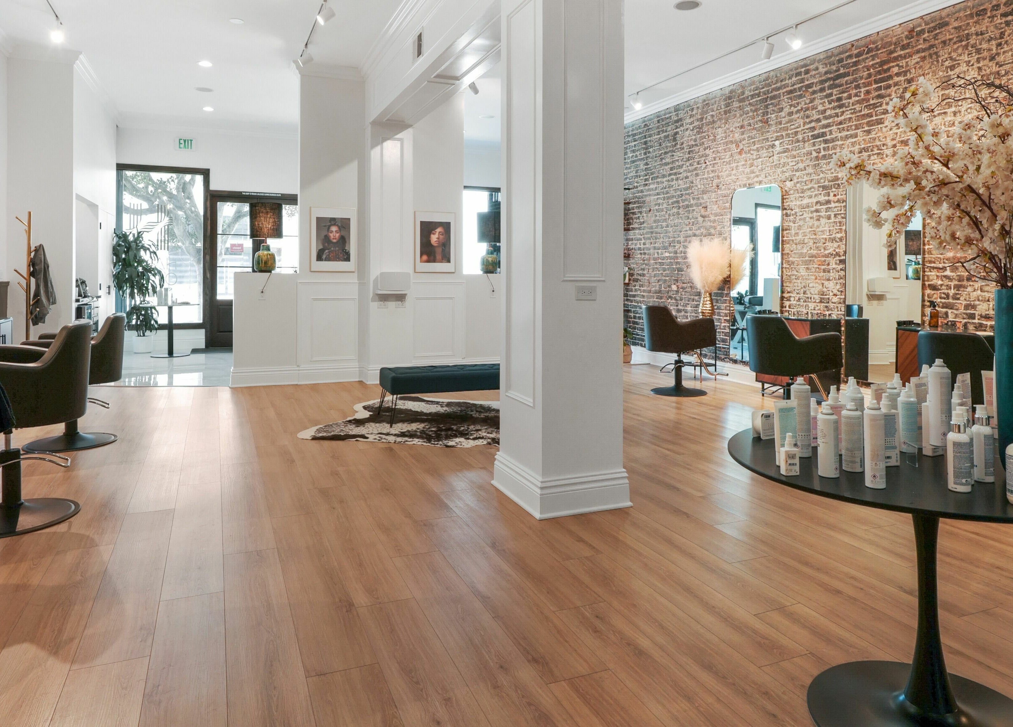 Modern interior of Halls Of Ivy Salon in Los Angeles, California, US with stylish decor and beauty products.
