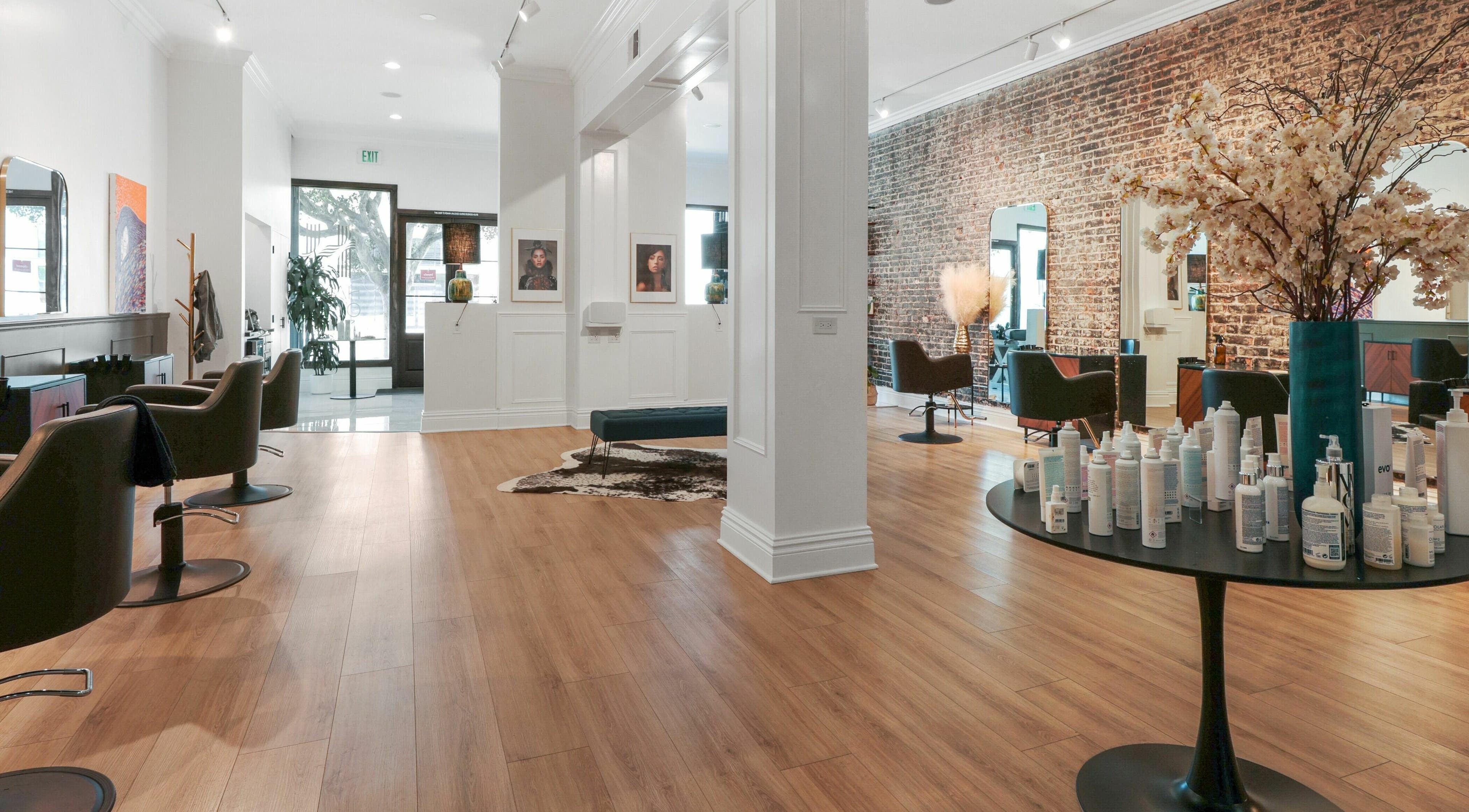 Modern interior of Halls Of Ivy Salon in Los Angeles, California, US with stylish decor and beauty products.