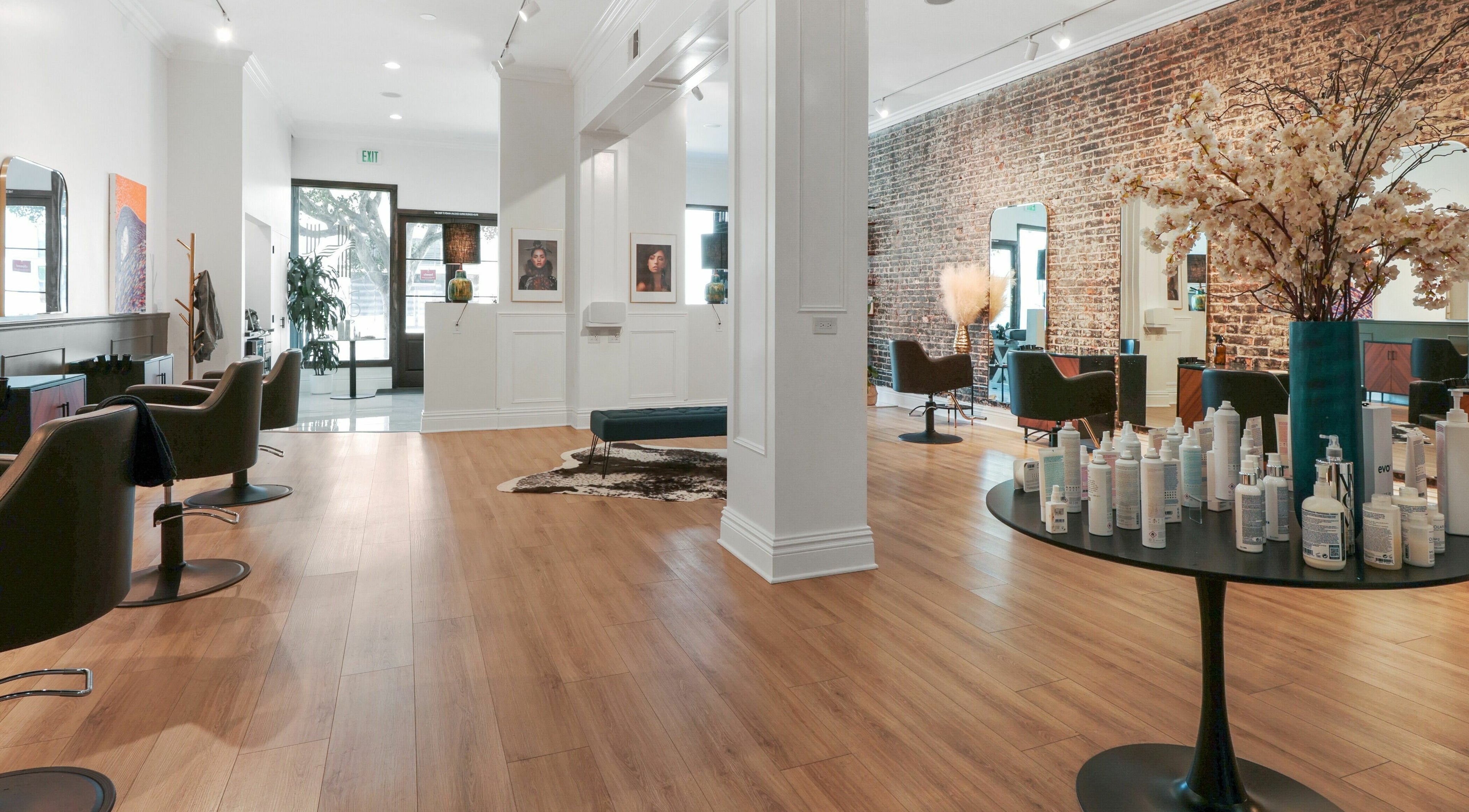 Modern interior of Halls Of Ivy Salon in Los Angeles, California, US with stylish decor and beauty products.