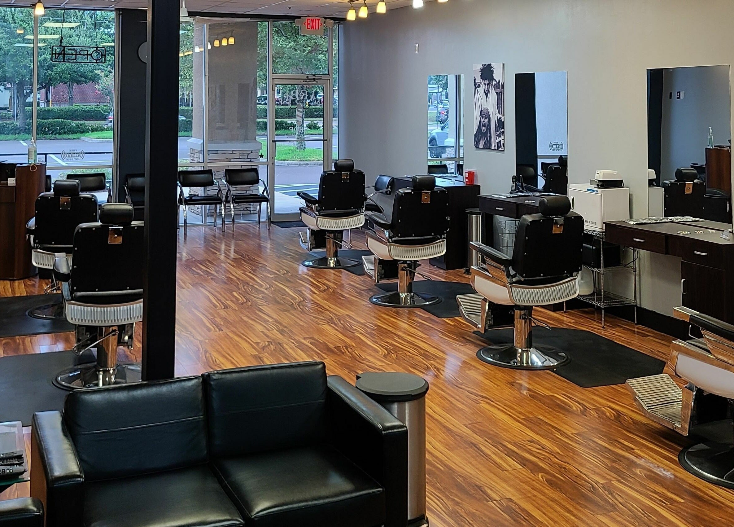 Interior of Blackbeard Barbering Company P.A in Fernandina Beach, Florida, featuring stylish barber chairs and decor.