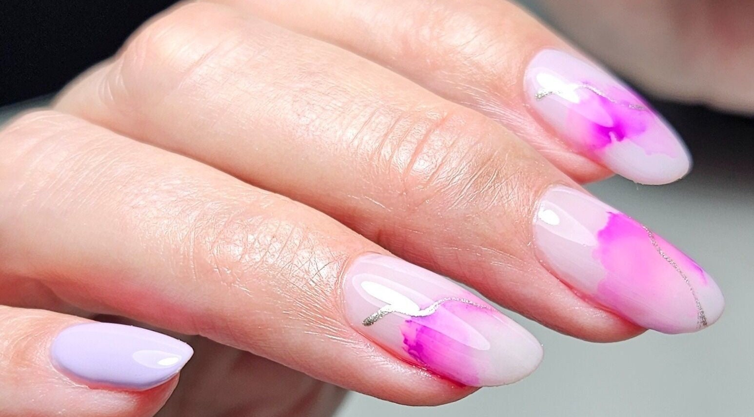 Elegant purple and pink nails at Re Beauty, Pietermaritzburg, KwaZulu-Natal, ZA, showcasing expert nail art.