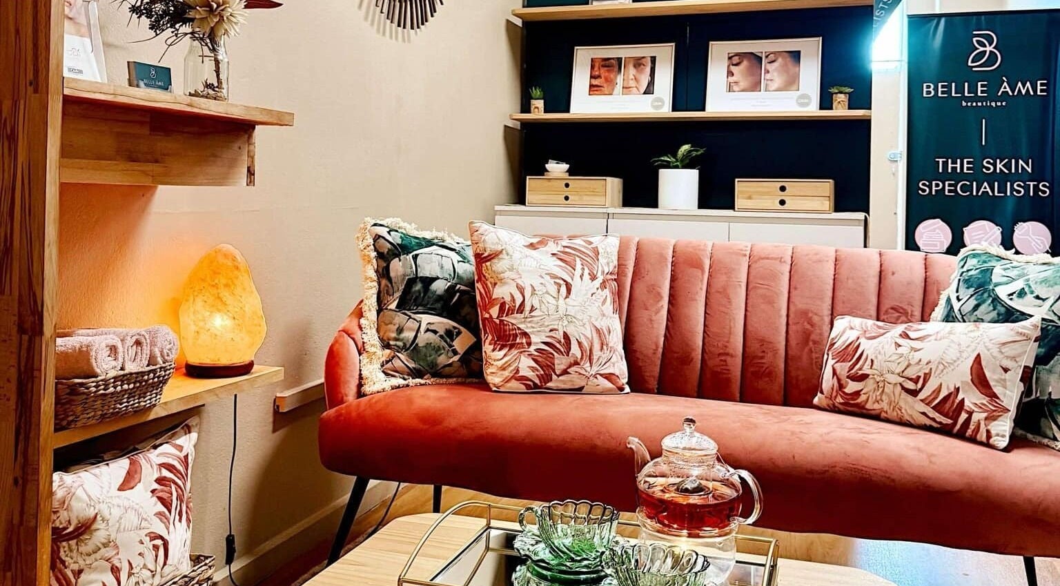 Chic and cozy lounge at Belle Áme Beautique, Gladstone Central, QLD, AU, with elegant decor and soft lighting.