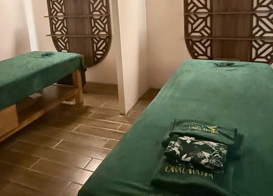 Relaxing massage room at LAWA LAWA SPA @Komtar JBCC, Johor Bahru, Johor Darul Ta'zim, MY with two green beds.