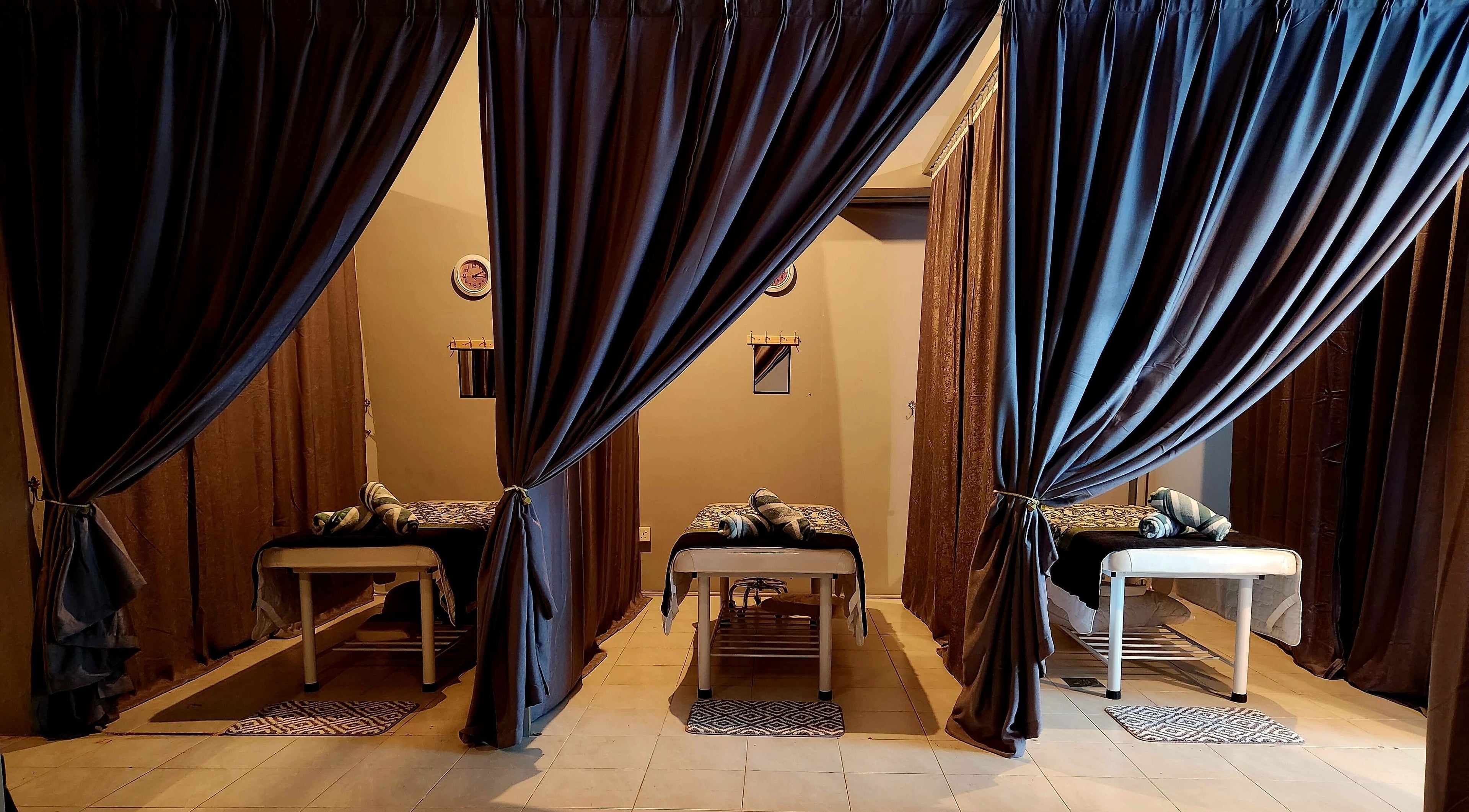 Private massage rooms at LAWA LAWA SPA @Larkin Sentral, Johor Bahru, Johor, MY with elegant draped curtains.