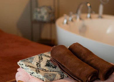 Plush towels in a calming spa setting at LAWA LAWA SPA @KSL City Mall, Johor Bahru, Johor, MY.