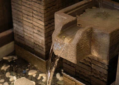 Tranquil stone waterfall feature at LAWA LAWA SPA @KSL City Mall, Johor Bahru, Johor, MY.