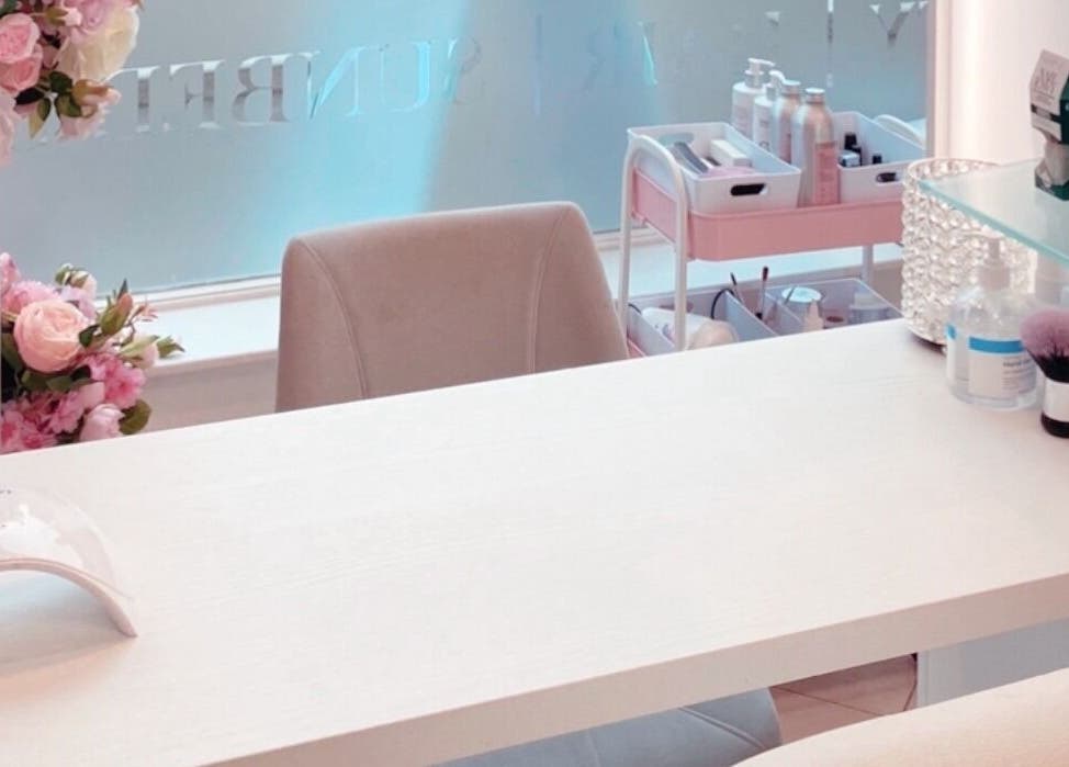 Manicure station with floral decor at Beautiful Bodies & Aesthetics, Bournemouth, England, GB.