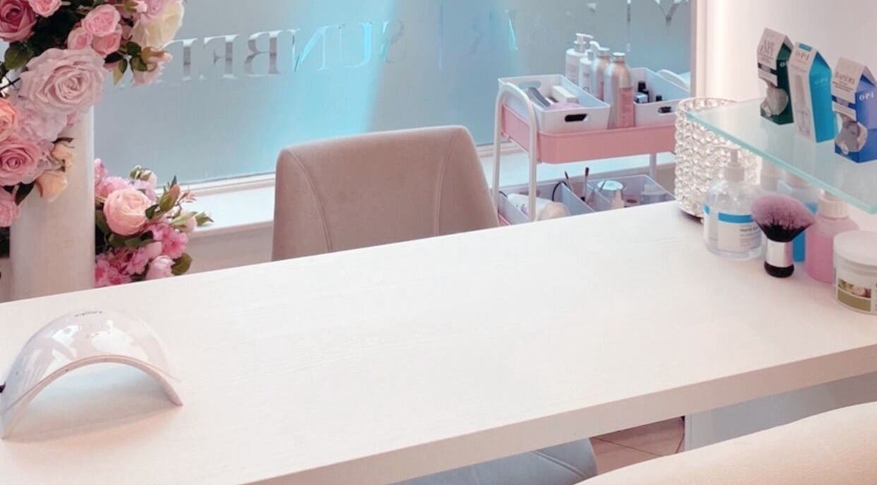 Manicure station with floral decor at Beautiful Bodies & Aesthetics, Bournemouth, England, GB.