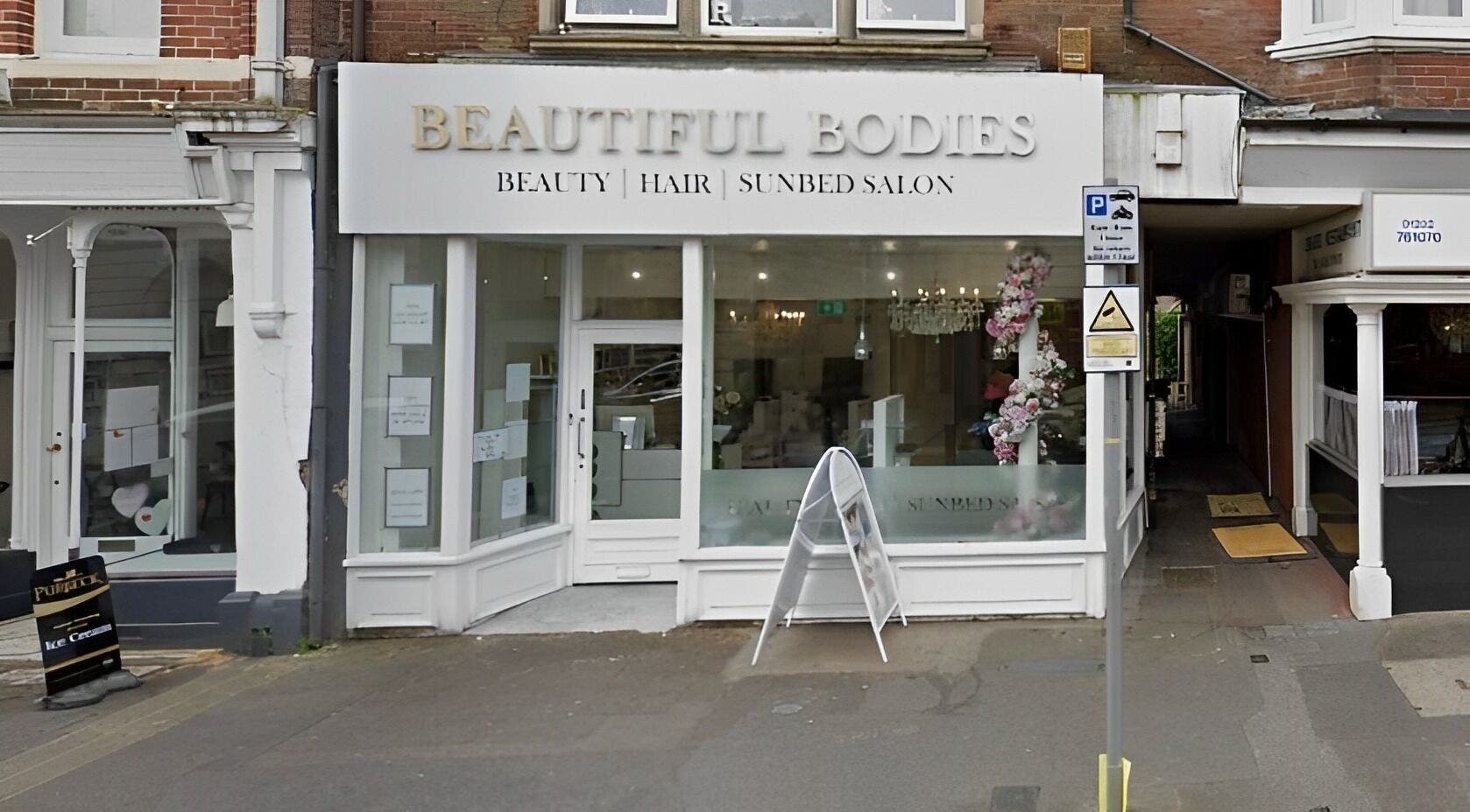 Beautiful Bodies & Aesthetics salon front on a bustling street in Bournemouth, England, GB.