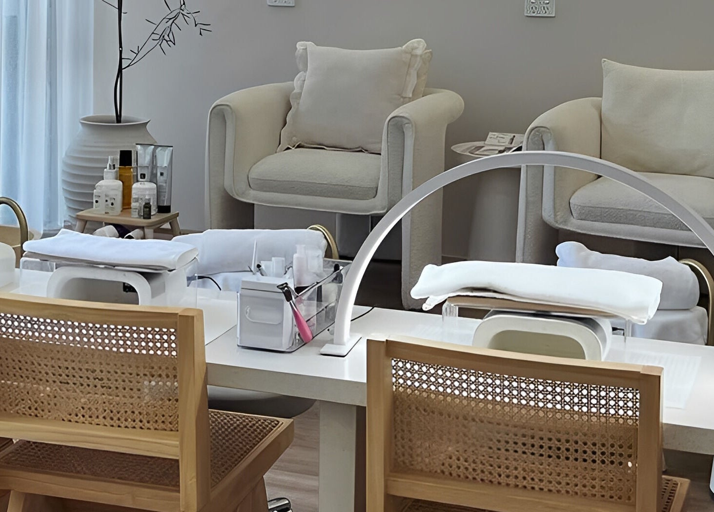 Relaxing nail service area at Séjour Spa and Nails, Eastgardens, New South Wales, AU with plush chairs and manicure stations.
