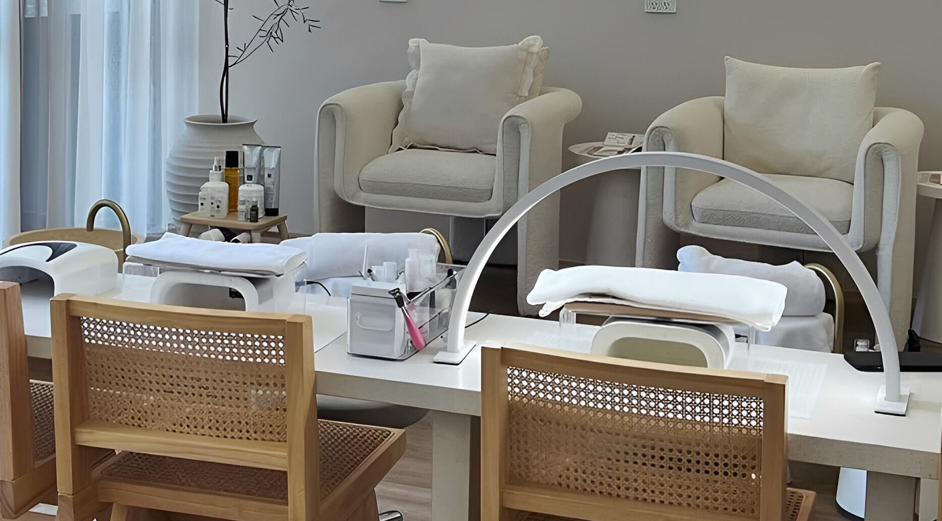 Relaxing nail service area at Séjour Spa and Nails, Eastgardens, New South Wales, AU with plush chairs and manicure stations.
