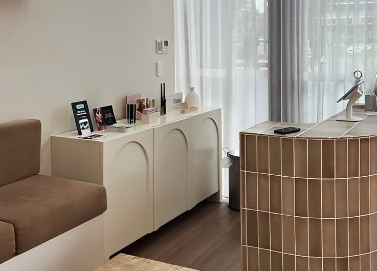 Reception area at Séjour Spa and Nails, Eastgardens, New South Wales, AU with modern decor and light ambiance.