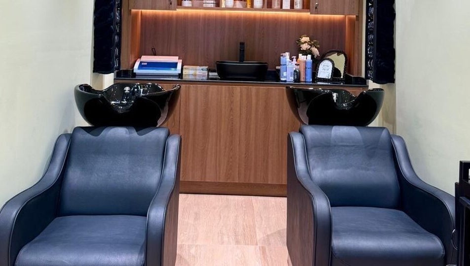 Modern wash stations at AZUL BEAUTY SALON-L.L.C, Abu Dhabi, Abu Dhabi, AE, featuring sleek chairs and shampoo sinks.