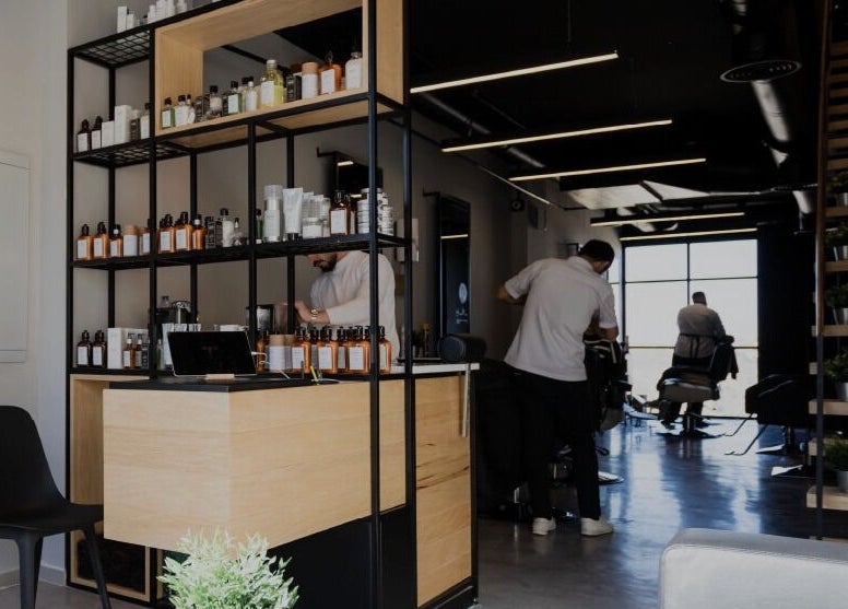 Modern interior of Yousef Afandi-Rabieh in Amman. Stylish shelves and barber chairs in Amman Governorate, JO.