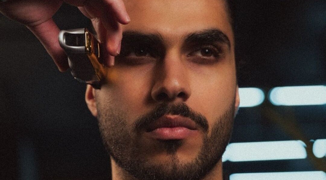 Professional barber trimming hair at Yousef Afandi Express-Sports City, Amman, Amman Governorate, JO.