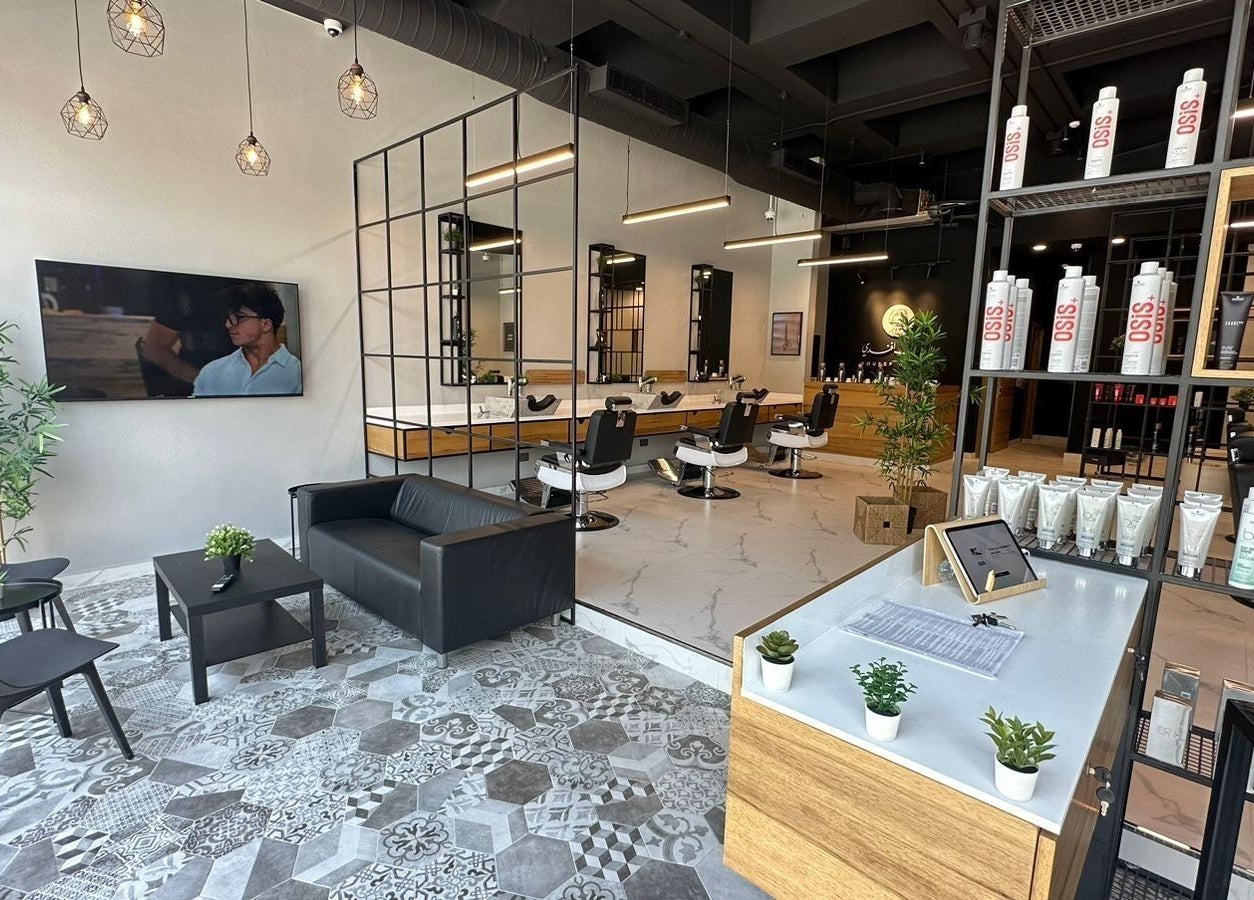 Chic interior of Yousef Afandi Express- University of Jordan, Amman, Amman Governorate, JO, featuring modern lounge chairs.