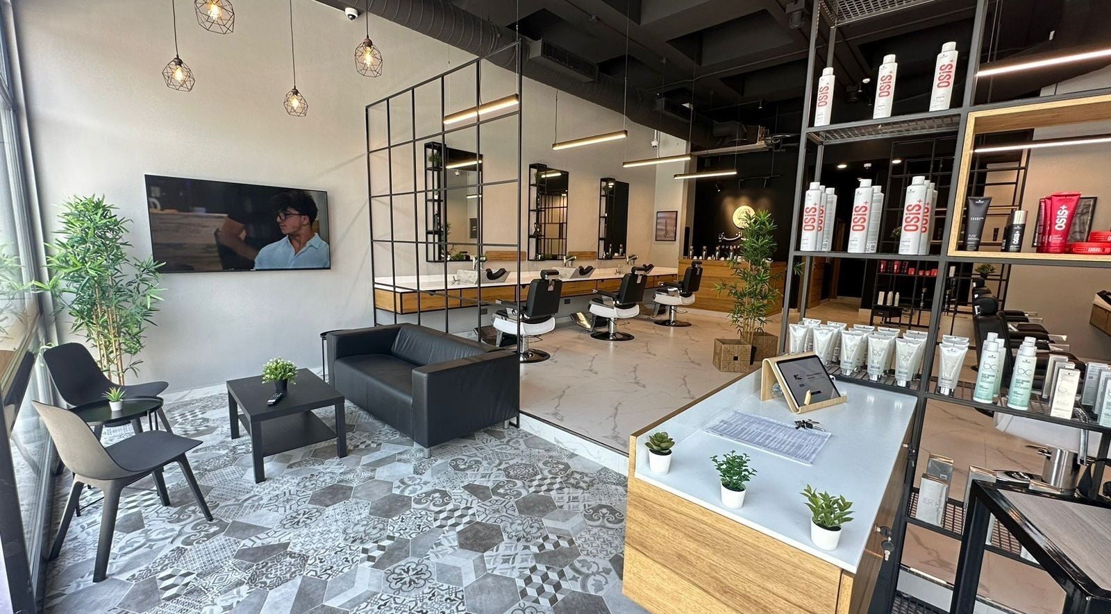 Chic interior of Yousef Afandi Express- University of Jordan, Amman, Amman Governorate, JO, featuring modern lounge chairs.