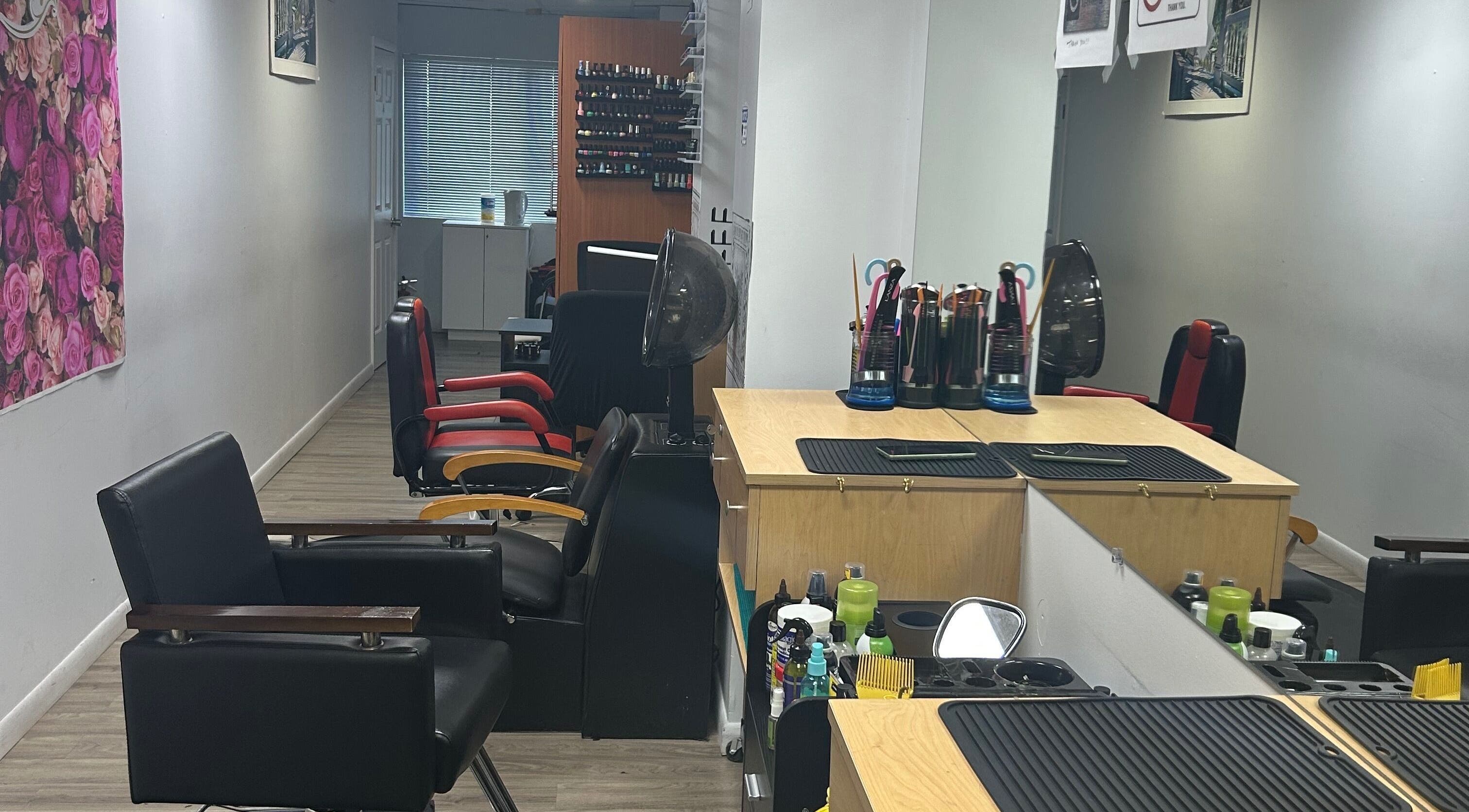 Modern salon chairs and styling stations at Beauty Hub, George Town, Grand Cayman, KY.