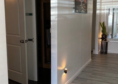 Calm hallway at Organic Thai Massage, Spa and Facial in Torrance, California, US, featuring modern decor.