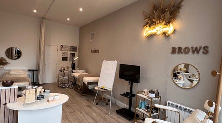 Connect Beauty salon in Brighton, England, GB with elegant treatment beds and decor.
