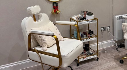 Luxurious beauty chair at Connect Beauty in Brighton, England, GB, next to a trolley with beauty products.