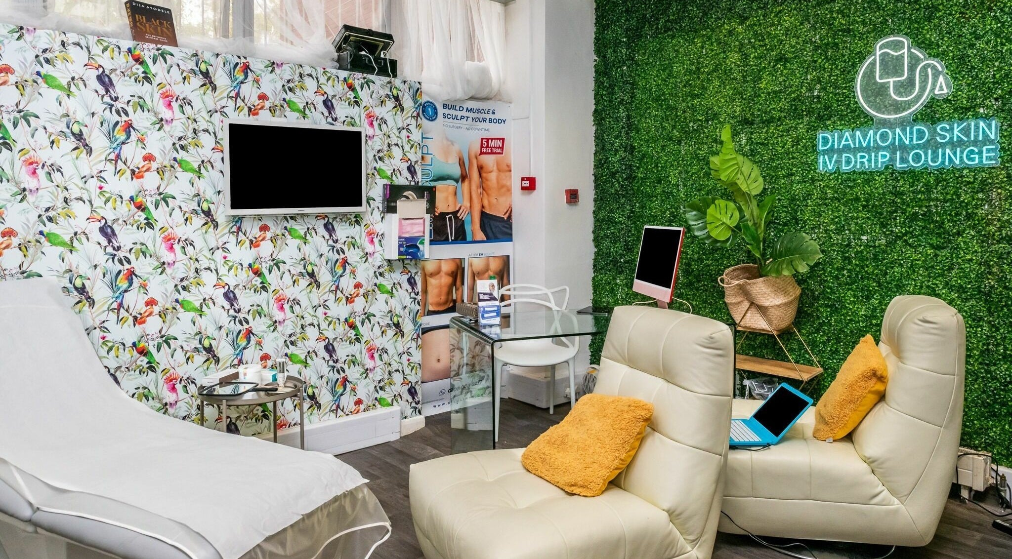 Relaxing lounge at Diamond Skin - Doctor Led Aesthetic and Laser Clinic in Wembley, England, GB with colorful decor.