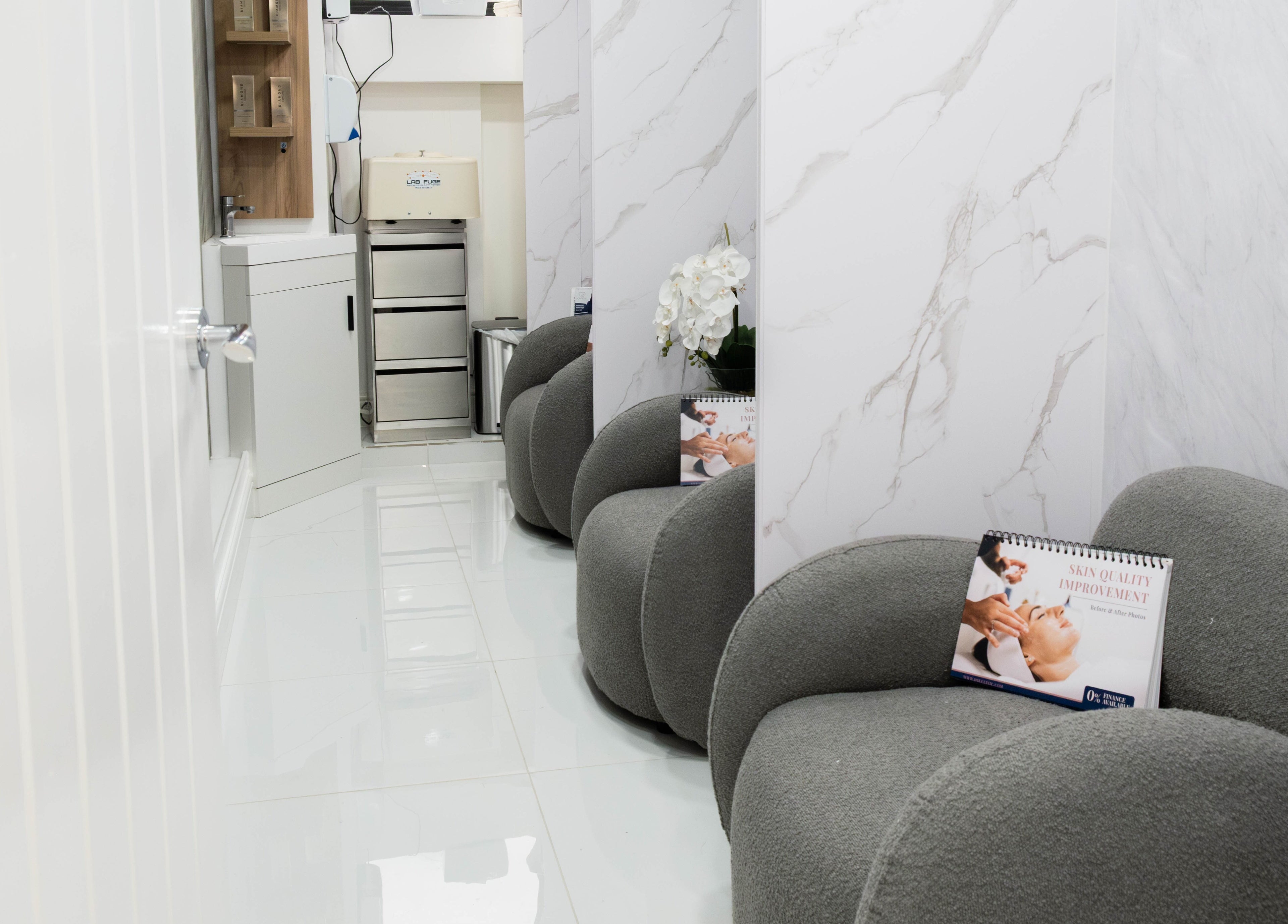 Comfortable seating area at Diamond Skin Doctor Led Aesthetic And Laser Clinic - Knightsbridge, London, England, GB.