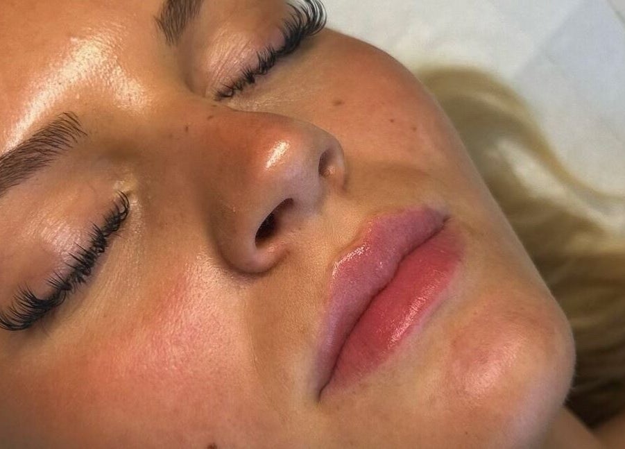 Relaxed client with glowing skin after facial at Enhanced by Els, Worthing, England, GB.