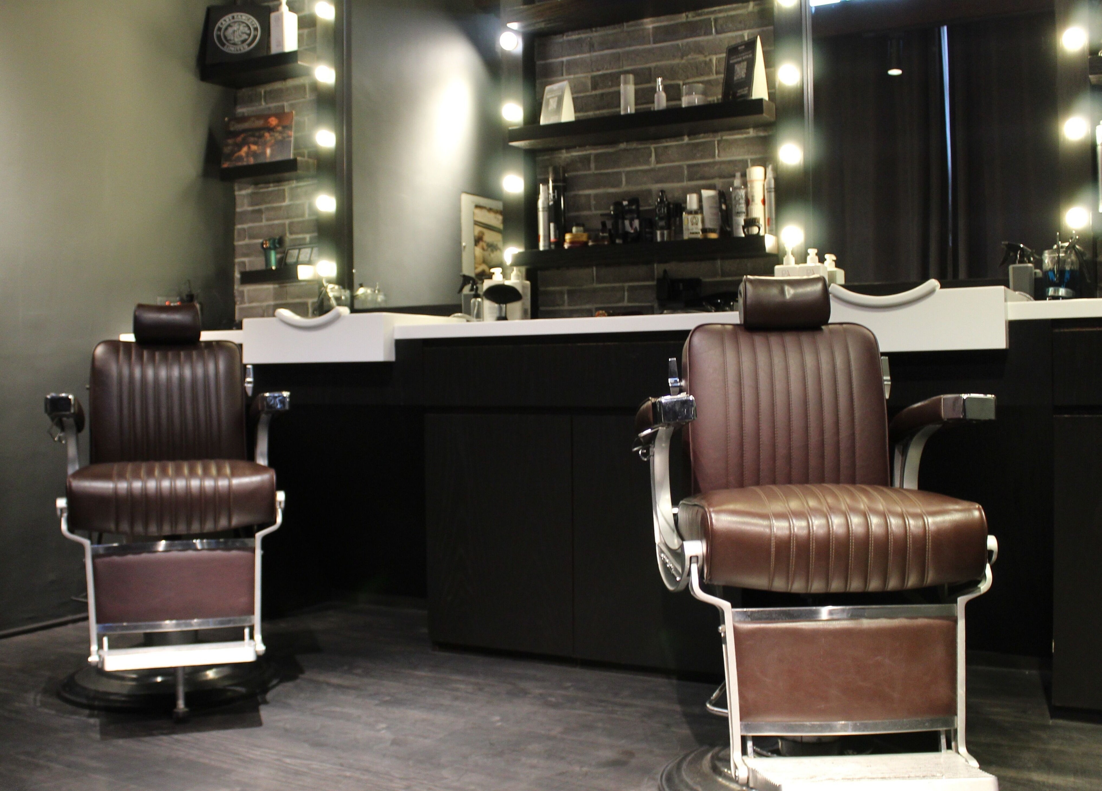 Luxurious barbershop chairs at Musk Barbershop JVC, Dubai, Dubai, AE offering a premium grooming experience.