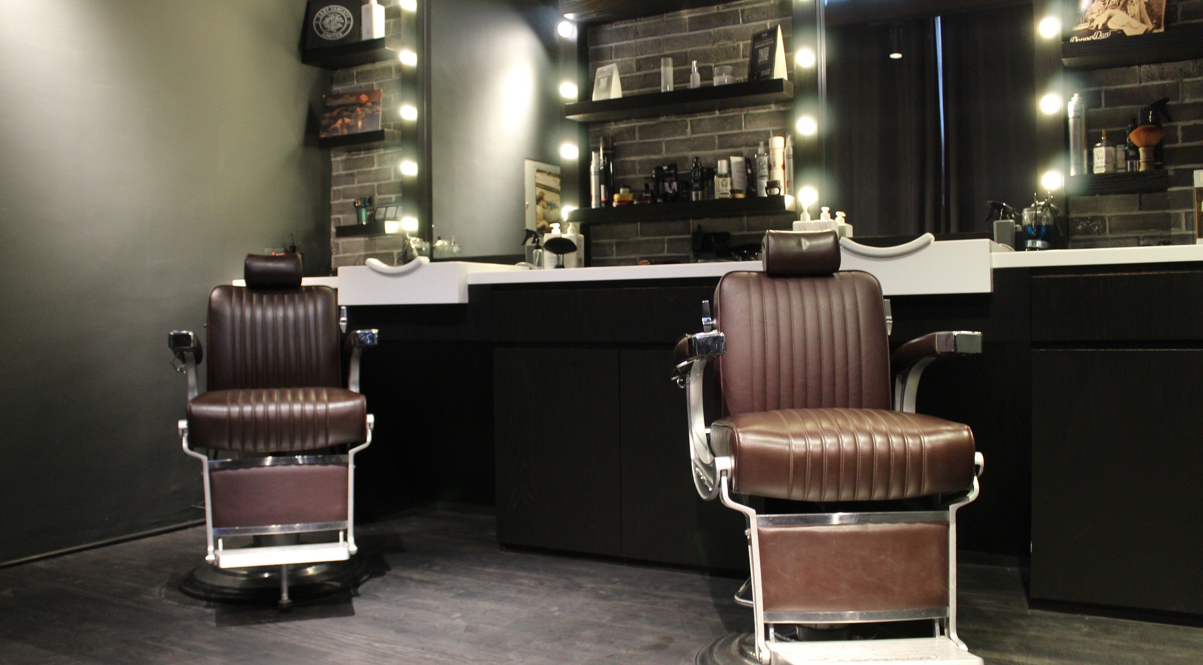 Luxurious barbershop chairs at Musk Barbershop JVC, Dubai, Dubai, AE offering a premium grooming experience.