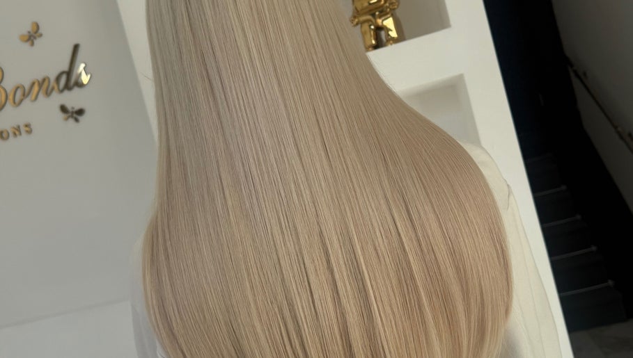 Long, silky blonde hair extensions at BellaBonds Hair Extensions, Tynemouth, England, GB.