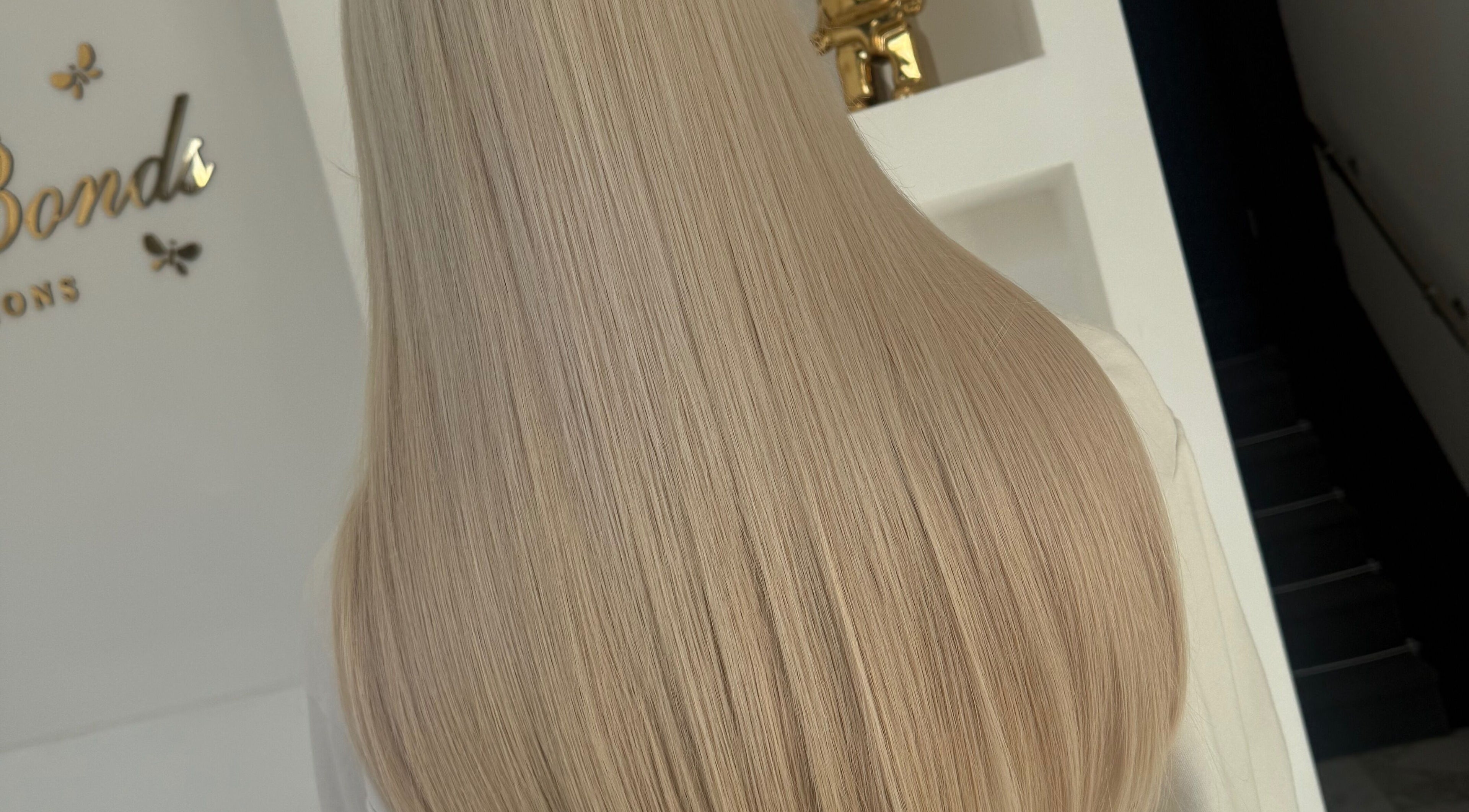 Long, silky blonde hair extensions at BellaBonds Hair Extensions, Tynemouth, England, GB.