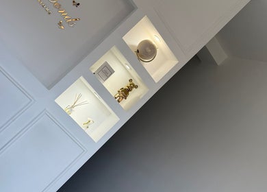 Chic interior decor of BellaBonds Hair Extensions, Tynemouth, England, GB showcasing stylish wall shelving.