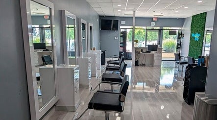 Interior of Magna Beauty Salon Ontario with modern styling chairs in Ontario, California, US.