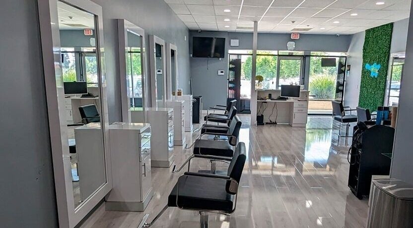 Interior of Magna Beauty Salon Ontario with modern styling chairs in Ontario, California, US.