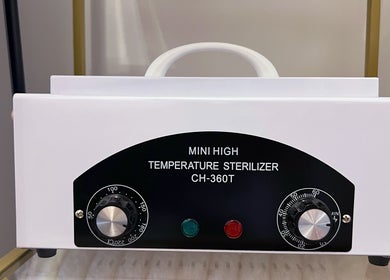 Professional sterilizer at Lash by Daria in London, England, GB, ensuring top hygiene standards.