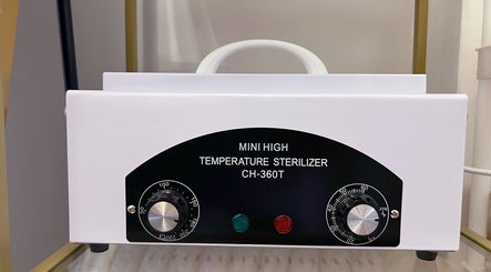 Professional sterilizer at Lash by Daria in London, England, GB, ensuring top hygiene standards.