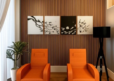 Modern lounge with orange chairs at @ Relax Union Square, Melbourne, Victoria, AU.