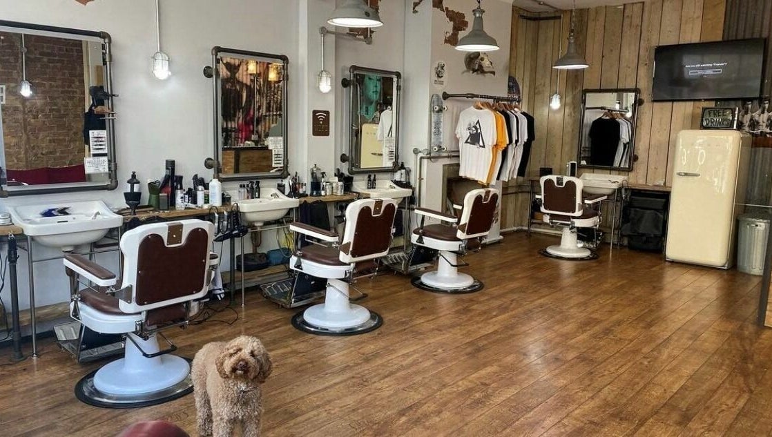 The Blind Barber Leigh-On-Sea offers vintage charm in Southend-on-Sea, England, GB with retro chairs and cozy decor.