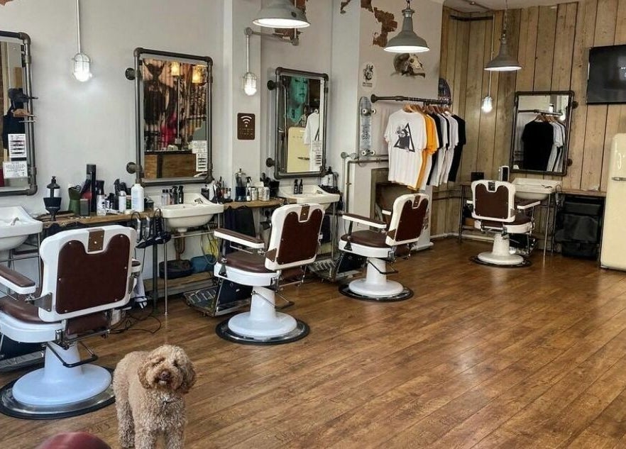 The Blind Barber Leigh-On-Sea offers vintage charm in Southend-on-Sea, England, GB with retro chairs and cozy decor.