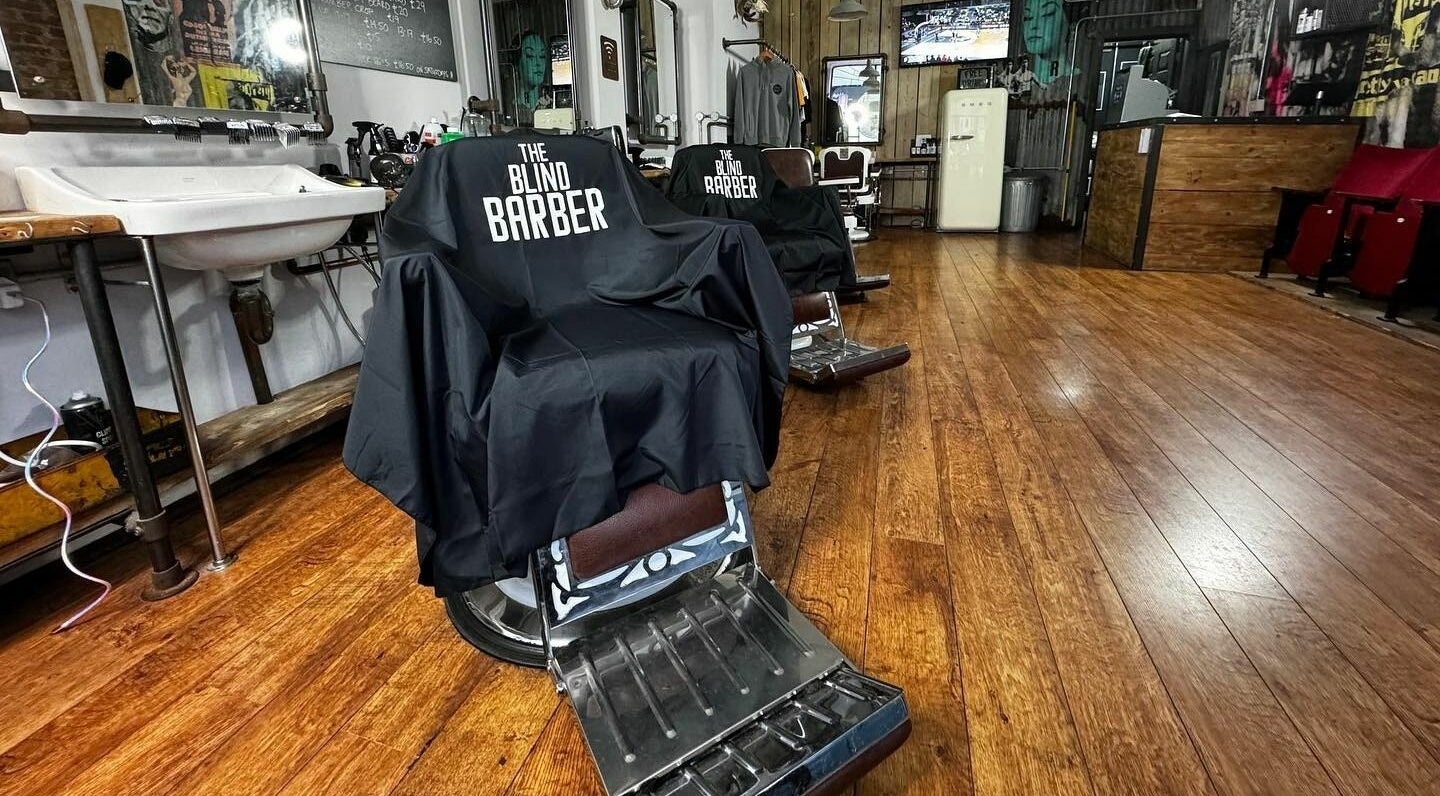 Stylish salon chairs at The Blind Barber Leigh-On-Sea in Southend-on-Sea, England, GB with modern decor.