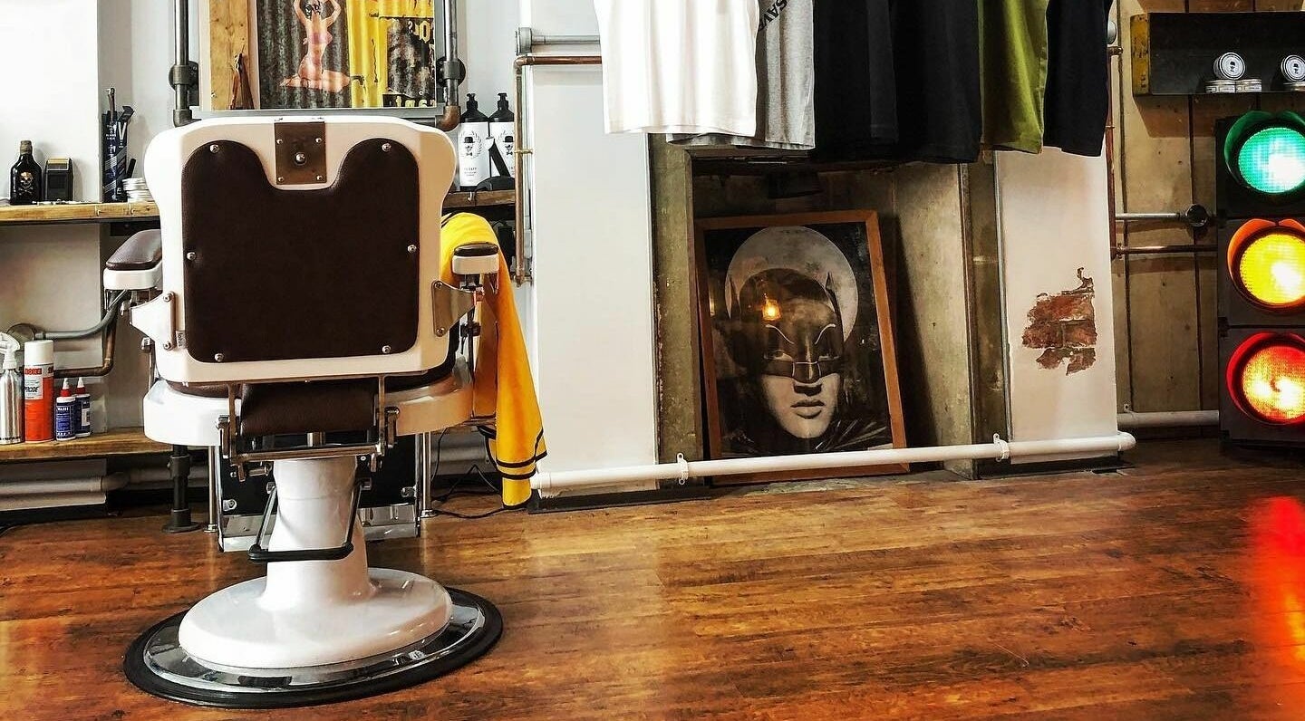 Retro barber chair at The Blind Barber Leigh-On-Sea, Southend-on-Sea, England, GB, highlighting unique decor.