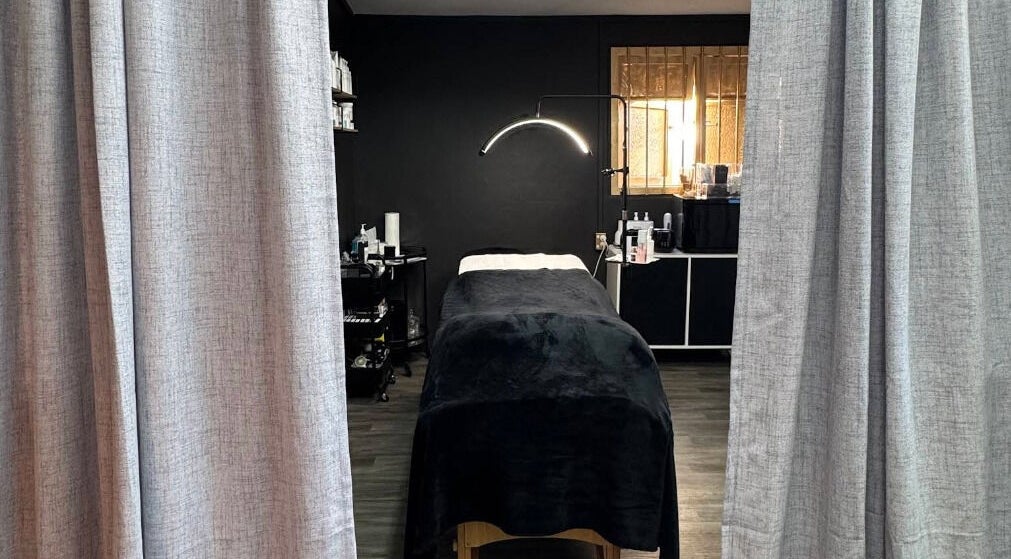 Relaxing treatment room at StudioEDIT, Kawakawa, Northland, NZ, with luxurious massage table and ambient lighting.