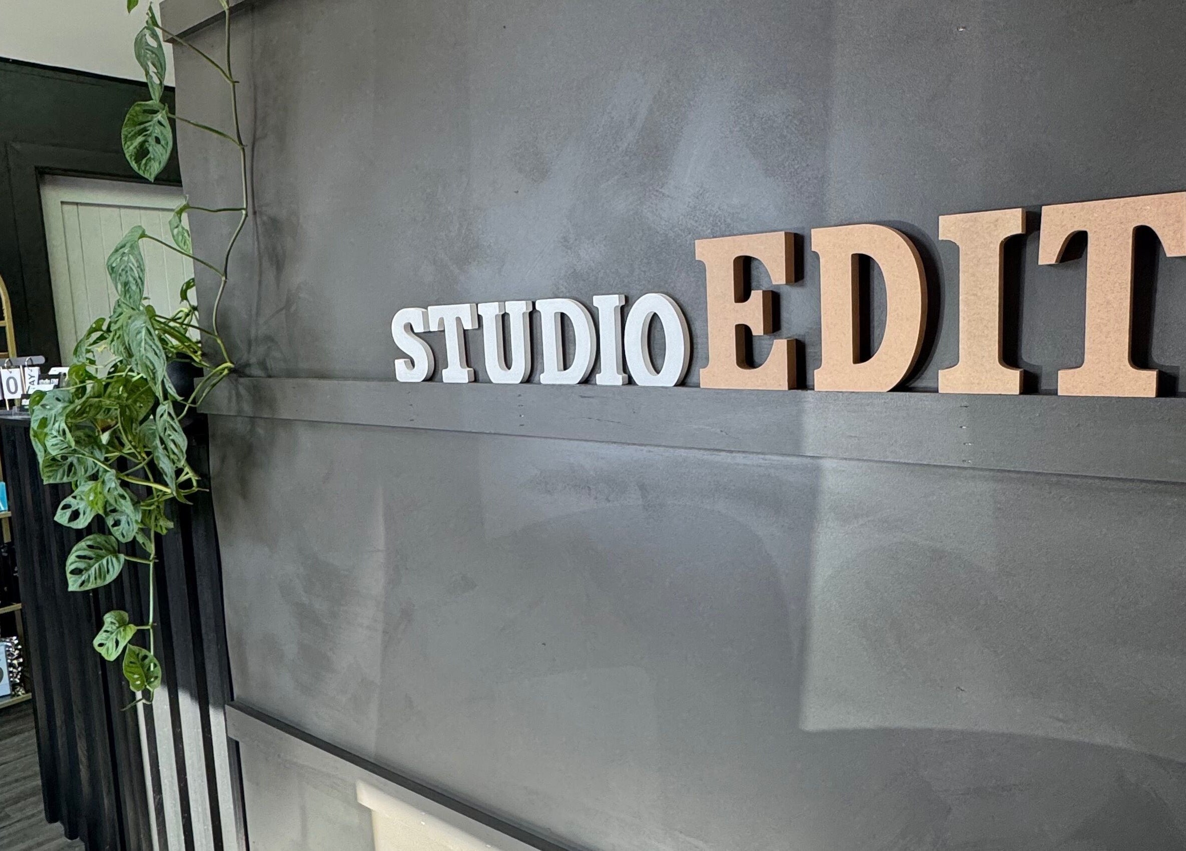 Interior of StudioEDIT with decorative wall and products in Kawakawa, Northland, NZ.