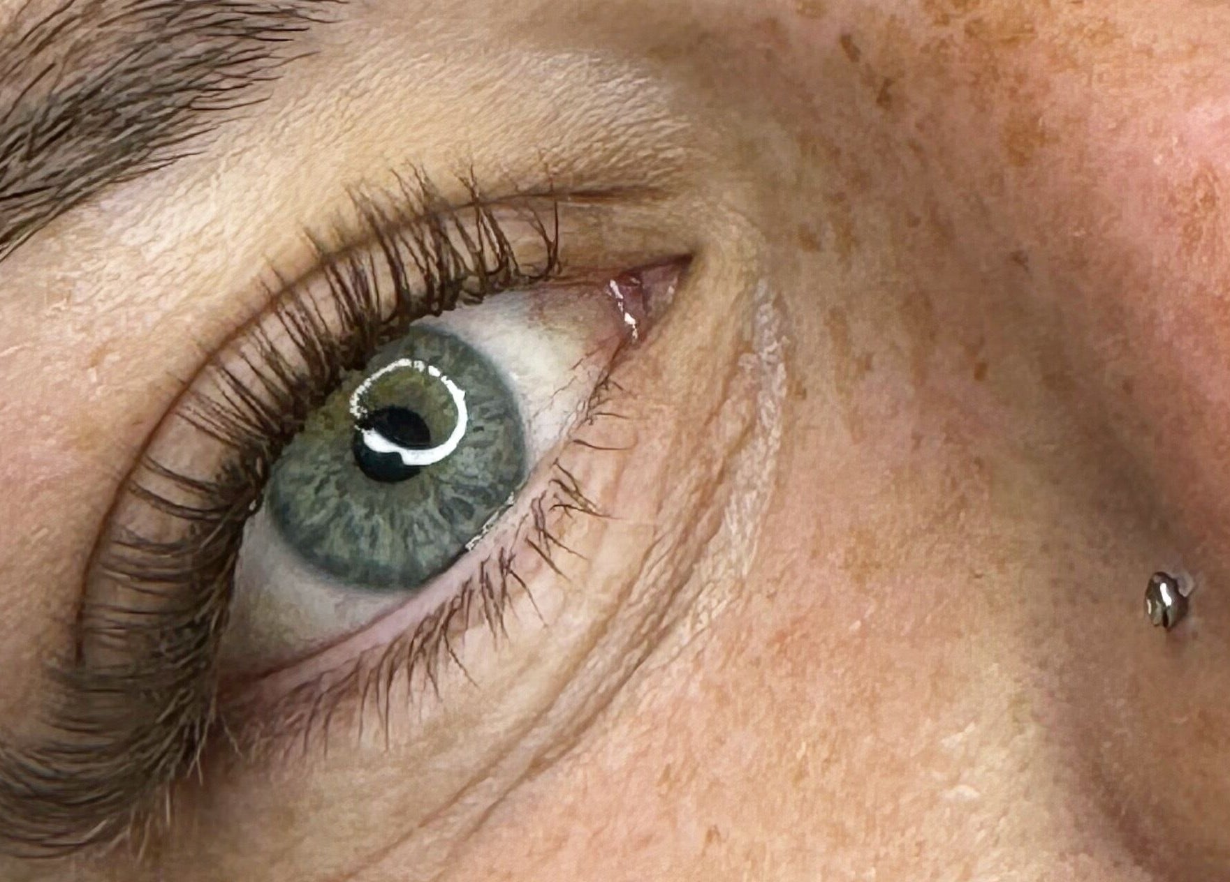 Close-up of an eye with piercing, showcasing beauty treatment at StudioEDIT, Kawakawa, Northland, NZ.