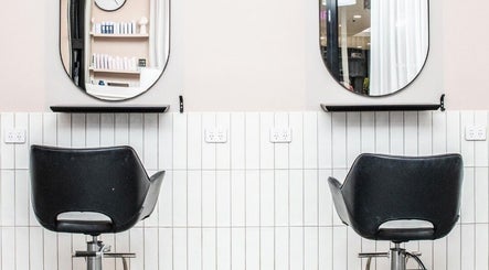Lux Hair Lounge salon chairs and mirrors, Narellan, New South Wales, AU. Sleek, modern styling.