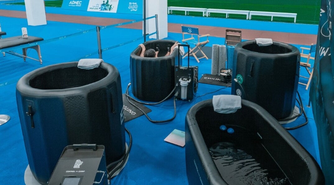 Relaxing in Celsius Cold Water Immersion tubs at Abu Dhabi venue, Abu Dhabi, AE.