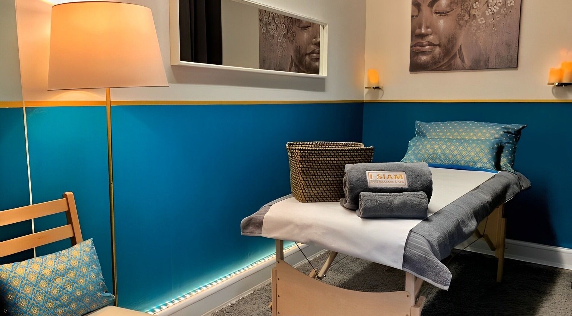 Serene massage room at I-siam Thai Massage & Spa, Chester, England, GB, featuring calming decor and peaceful ambiance.