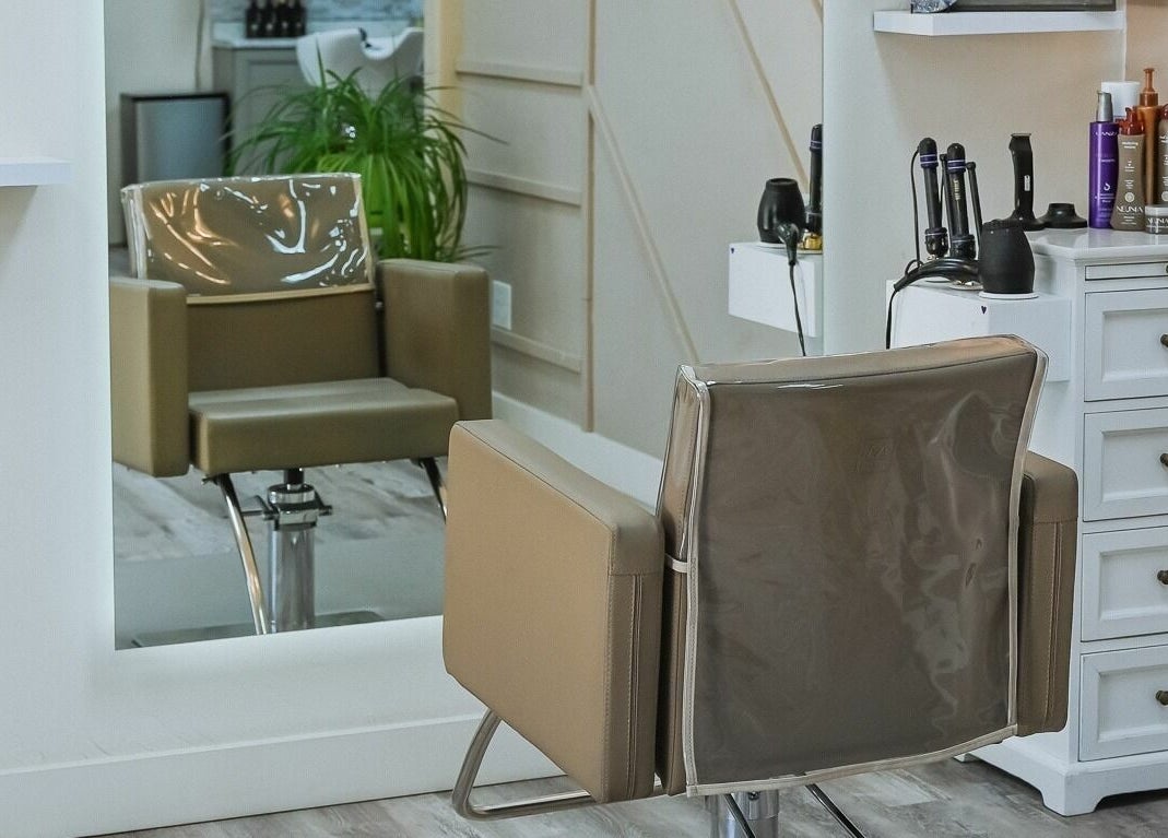 Modern salon chair and equipment at A Borgata Salon, Prescott, Arizona, US, offering a luxurious experience.